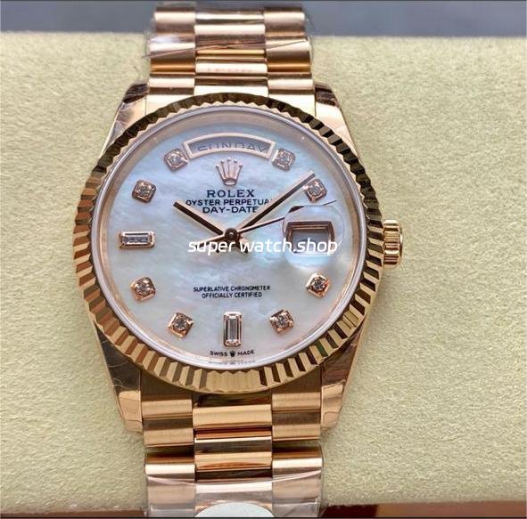 8-Factory-Counterweight-Rolex-Day-Date-128235-0029-36mm-Full-Rose-Gol-9.jpg 8+ Factory Counterweight Rolex Day-Date 128235-0029 36mm Full Rose Gold Diamond Mope&Baguette Diamond Mother Of Pearl Dial - Image 1