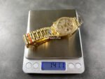 8+ Factory Counterweight Rolex Day-Date 128348RBR-0030 36mm Diamond Yellow Gold Bezel Full Yellow Gold Baguette Diamond Yellow Gold Dial - Image 9