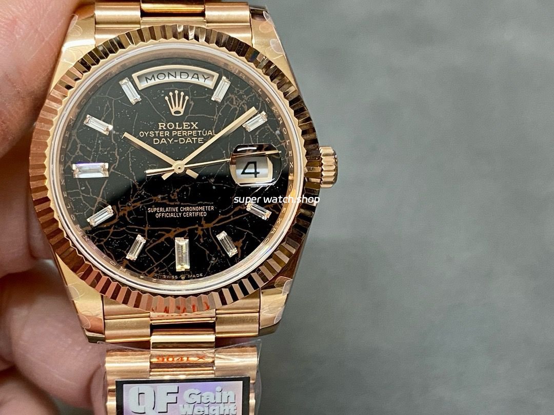 QF-Factory-Counterweight-Rolex-Day-Date-228235-0045-40mm-Full-Rose-Gol-5.jpg QF Factory Counterweight Rolex Day-Date 228235-0045 40mm Full Rose Gold Baguette Diamond Black Dial - Image 1