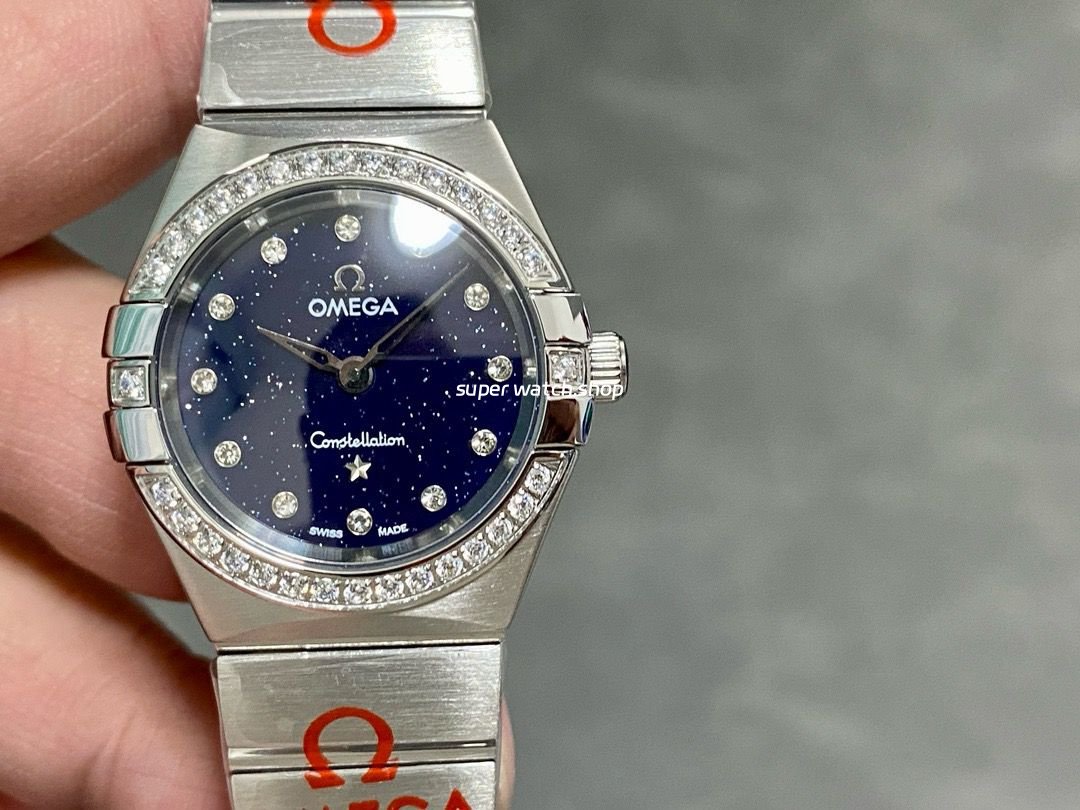 TW-Factory-Omega-Constellation-Quartz-131.10.25.60.53.001-27mm-Diamond-Bezel-Full-Steel-Diam.jpg TW Factory Omega Constellation Quartz 131.10.25.60.53.001 27mm Diamond Bezel Full Steel Diamond Gypsophila Blue Dial - Image 1