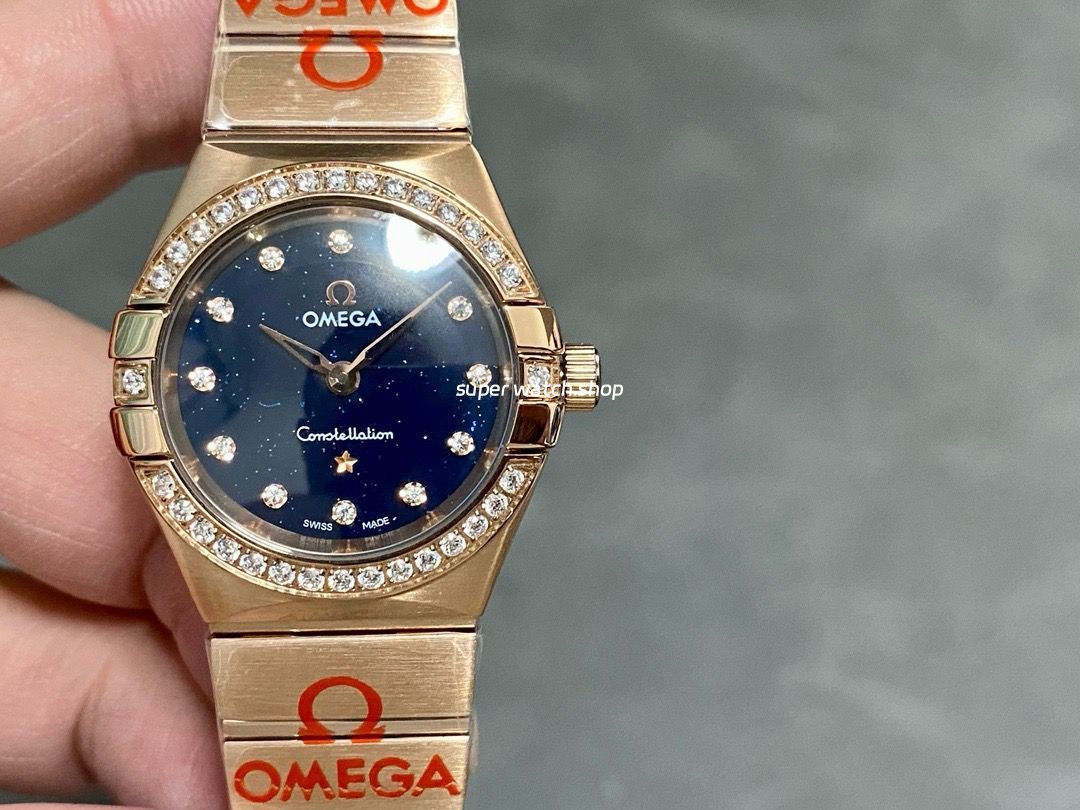 TW-Factory-Omega-Constellation-Quartz-131.55.25.60.53.002-27mm-Diamond-Bezel-Full-Rose-Gol-1.jpg TW Factory Omega Constellation Quartz 131.55.25.60.53.002 27mm Diamond Bezel Full Rose Gold Diamond Gypsophila Blue Dial - Image 1